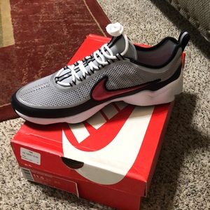 Gray mesh, red, black and white